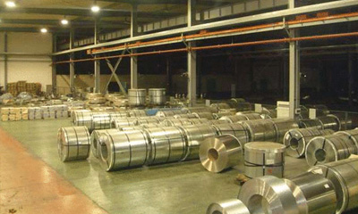 Reduction of tin in tinplate material